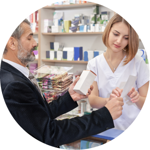 Pharmacist helping man with his medication/prescription.